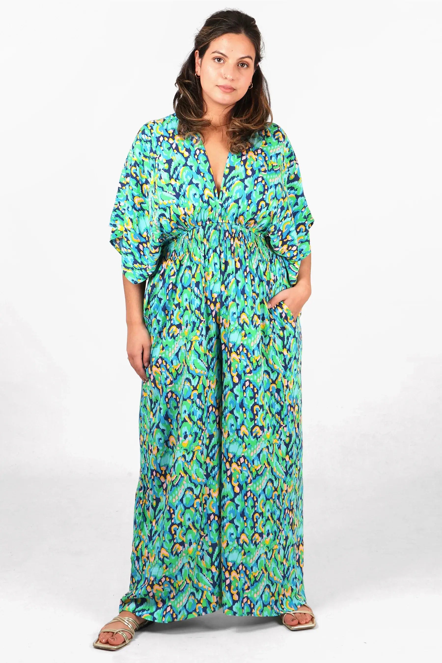 Abstract Print Flared Wide Leg Shirred Jumpsuit - Green & Blue Structured jumpsuit, Tailored fit, Professional, Elegant Abstract Print Flared Wide Leg Shirred Jumpsuit - Green & Blue Structured jumpsuit, Tailored fit, Professional, Elegant