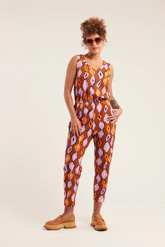 Chain Reaction Jumpsuit Chic jumpsuit, Minimal design, Sleek, Trendy